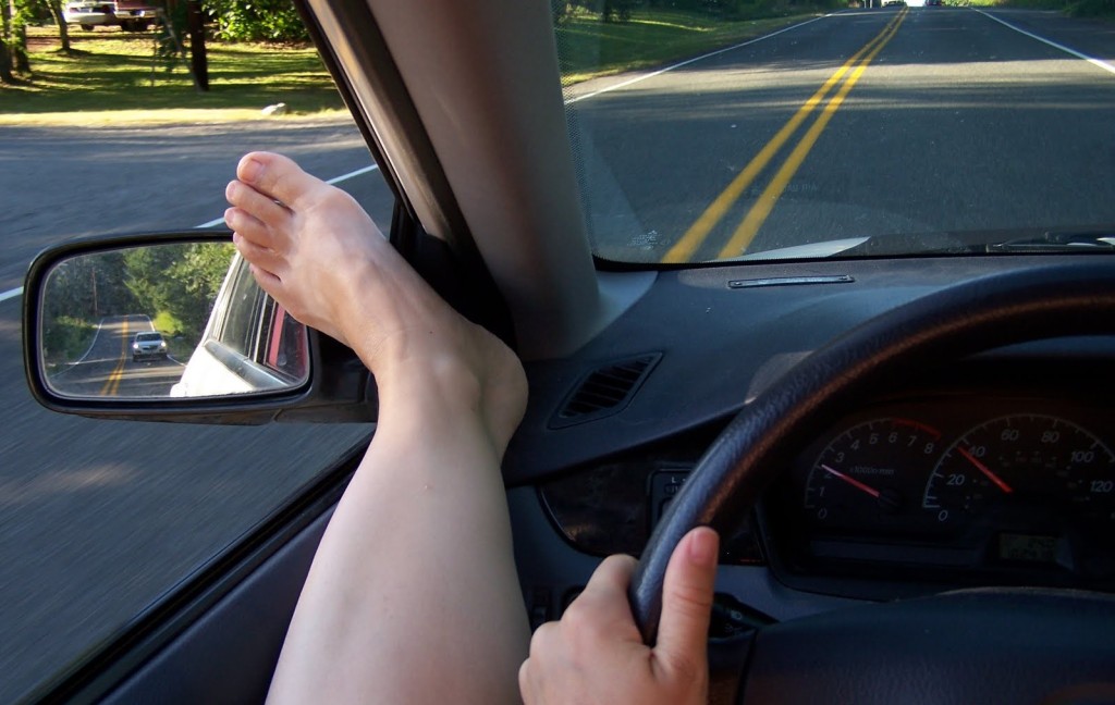 Craziest things people do while driving-leg-out-of-window